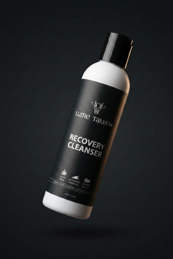 Lume Tallow Recovery Cleanser bottle floating against a moody dark studio background — a sulfate-free charcoal face wash for post-microneedling, post-laser, eczema-prone, and chronically dry skin
